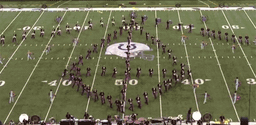 stability:Carolina Crown Drum Corps rotates 3D Prism on Field (x)