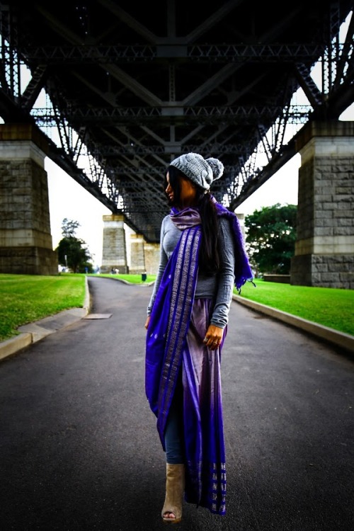 Under the bridge in an everyday saree