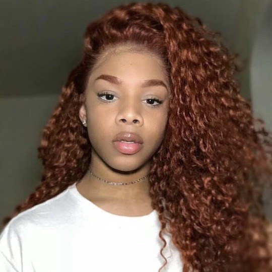 jojordan:       auburn hair on brown skin  