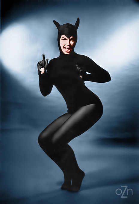 oldiznewagain:  Bettie Page in a cat suit, photo by Bunny Yeager (colorized) 