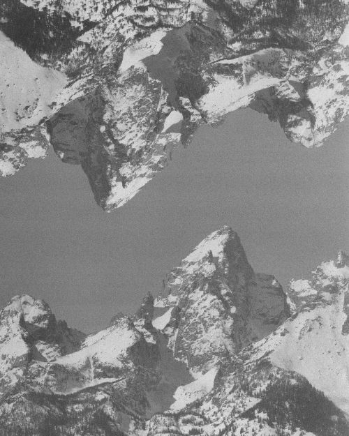 A double exposure reflection of the Tetons from March on Ilford HP5 Plus Black and White. Using a te