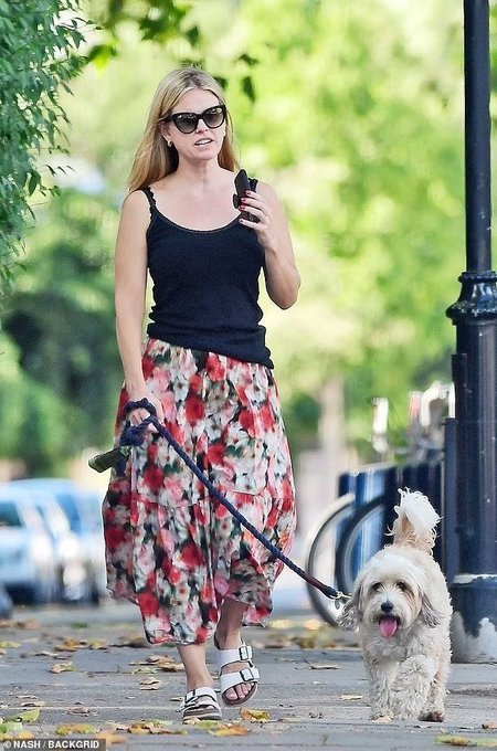 Alice Eve with Buddy in Lonndon in August. 