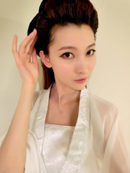 chinkqueen-li:  I get horny everytime wearing traditional chink dress, who wants to get off my clothes and help me out?
