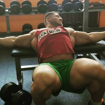 He Was Doing A Set Of Dumbbell Pullovers--lats Pumped Out Like Crazy--when I Hit Him With The Dart. It