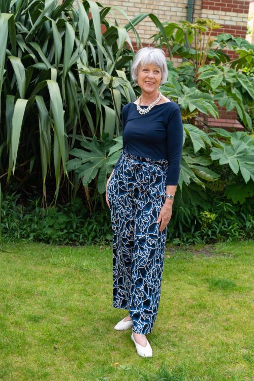 Her grandson’s friend was naughty, so she took him to the woodshed. 