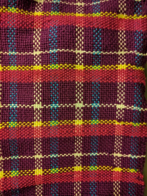 Crystal Prep Academy Plaid ScarfMy first project off my rigid heddle loom.Approx 9″ x 68.5″ long.