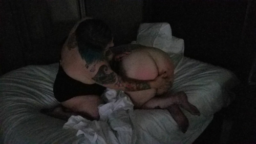glitterdustedbitch:  Getting a good spanking from @punishedtattooedprincess and @thebeard81. Getting me nice and wet for daddy to fuck. @biggdaddy73