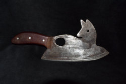 fowl-fox:An antique fox shaped cleaver