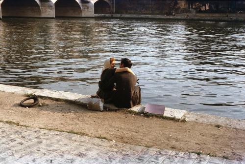 A couple at the riverside of the Seine, Paris, 1958.