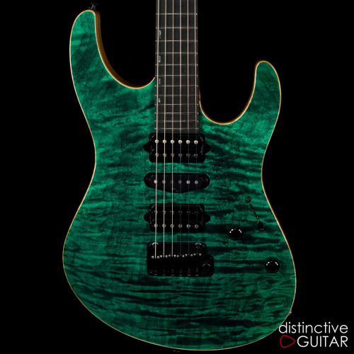 Suhr Modern Custom Trans Teal Quilt Top [Source: Distinctive Guitar. Price: £3,964/$5,235]Glorified 