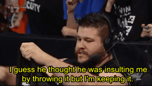 12roundsofambrose:  sethdeanromangifs:  Kevin Owens gets an unexpected present. 