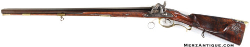 A percussion muzzleloading .58 caliber rifle/20 gauge shotgun combo, German, 19th century.For sale b