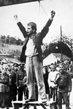 oipunxandskins:  wobblydash:   Croation antifascist Stjepen Filipovic, moments before execution, 1942  Words cannot describe how badass this guy is.  Stjepen lives 