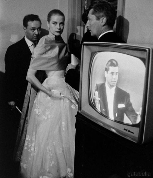 Grace Kelly backstage at the 1956 Oscars, Jerry Lewis on the TV presenting.  #gracekelly #jerrylewis