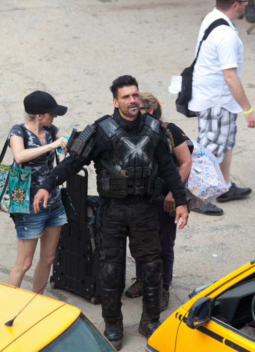 kingdomdaily:  Frank Grillo waves to the photographers while walking around set between takes of Captain America: Civil War on Monday morning (May 18) in Atlanta, Ga.The 49-year-old actor took off his mask and showed off some special effects scarring