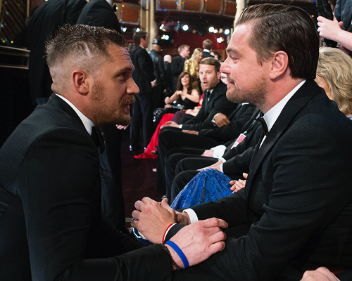 clark-kents:  Tom Hardy and Leonardo DiCaprio during the 88th Annual Academy Awards at Dolby Theatre on February 28, 2016 in Hollywood, California. 