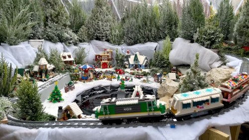 laughingsquid: Man Builds Snowy Backyard Forest for a Giant LEGO Train to Deliver Holiday Presents t