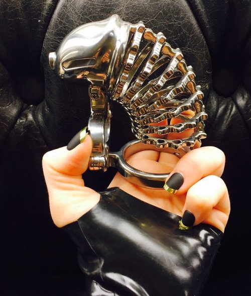 megafamousblizzardbouquetus:love the look of the chastity cage .. but just look at those nails they&