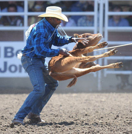 That’s legendary rodeo cowboy Fred Whitfield (top right), riding alongside his friend and rode