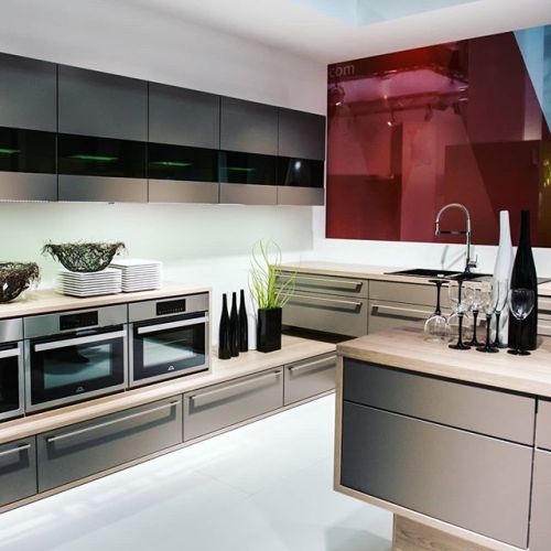 While this is a display, it shows exciting ways to use cabinetry, appliances and color. How would yo
