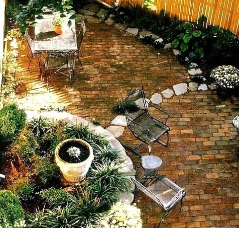 Landscape - Brick PaversInspiration For A Summertime Brick Water Fountain Landscape In A Small, Eclectic