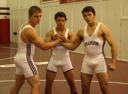 jockbrad:  Swimmers, wrestlers, football players / singlets, jockstraps, speedos and spandex! http://jockbrad.tumblr.com/archive 