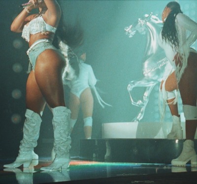 bywomon:my gf took these fire ass 35mm film camera stills of Meg Thee Stallion in