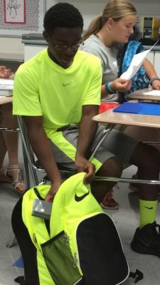 blackumi:  thagal:  this person obviously took this picture trying to make fun of him but hes straight finessin, transcending, hes on a different plane of existence. We are plebs   This is a black kid, who knows he’s black, and would like to be seen.