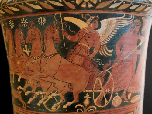Hades, in a chariot driven by a winged Erinys (Fury), carries off Persephone (far right).   Side B o
