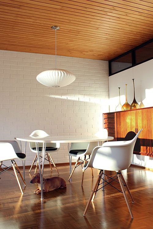 urbnite: Eames Molded Armchair (Dowel Legs)  George Nelson Lamp Collection