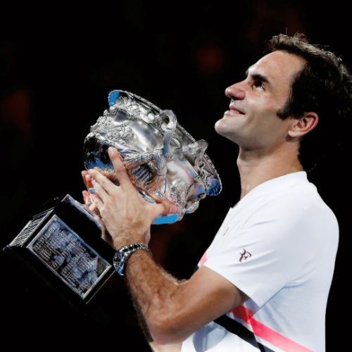 oliviergiroudd:Roger Federer of Switzerland poses with the Norman Brookes Challenge Cup after winnin