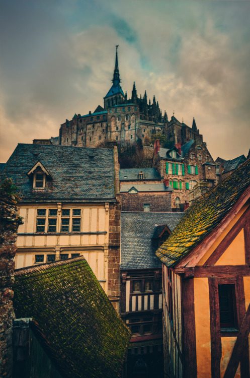 travelingcolors:  The Towering Old Village, Mont Saint Michel | France(by Trey Ratcliff) 