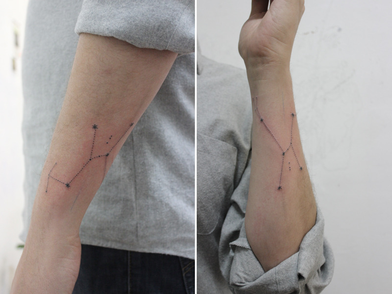 Hand poked Sagittarius constellation tattoo on the