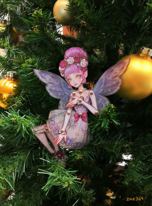 Took these pictures early January right before taking down the tree. Fairy paper dolls.This was the 