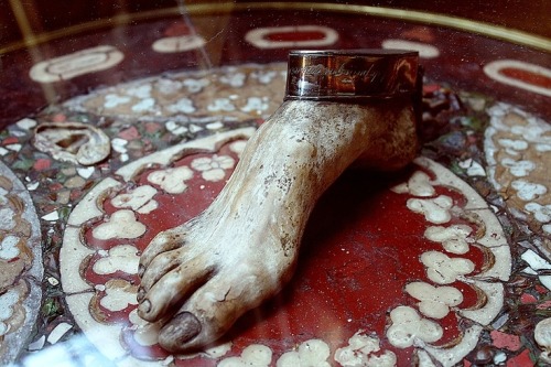 The Table, “Created by Efisio Marini - This table is formed of petrified brain, blood, bile, liver, lungs and glands on which sits a foot, four ears and cut vertebrae which are also petrified.” taken @ Musée d’Histoire de la Médecine, Paris