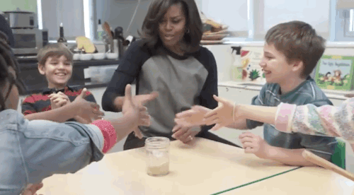 profeminist:minusthelove:eaudrey35:spoonmeb:micdotcom:Watch: Michelle Obama surprised some elementar