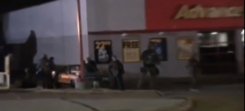 caliphorniaqueen:  trexbait:   quickweaves:  krxs10:  in case you missed it: a new video surfaced on the Internet this week showing SWAT team police officers setting fire to a car and the building next to it right after the announcement that Darren Wilson