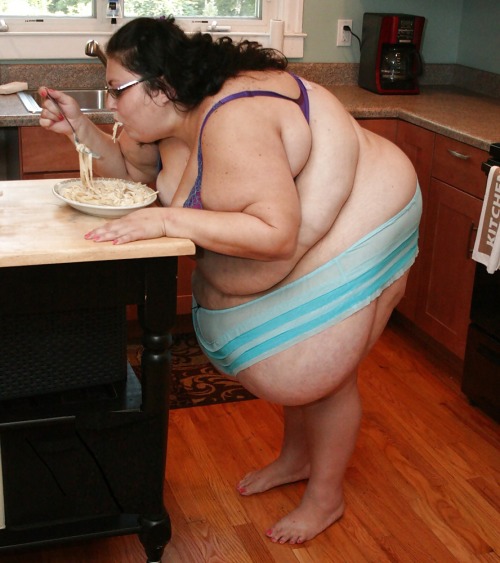 thecutewhale:  Gina loved pasta.  The carbohydrates did strange things to her body, adding tremendous amounts of fat to her once slender frame.  But Nick did not care.  In fact, he preferred her voluptuous shape.  He would cook for her, and tell her to