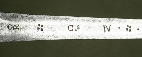 art-of-swords:  Spanish Bilbo Sword Dated: circa 1700 Culture: Spanish, probably Toledo Medium: steel, wood Because of the inscriptions on the blade a crowned “R” (probably the maker’s mark), the letter “C” followed by the roman number “IV”