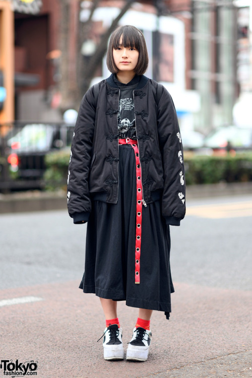 15-year-old Japanese student Nanase on the street in Harajuku wearing a panda themed style with a pa