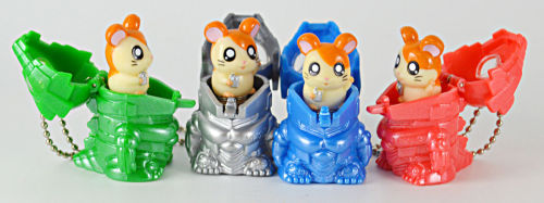 astoundingbeyondbelief:  Some toys from that odd three-year period where Toho released Godzilla and Hamtaro movies as double features. Photos from eBay. 