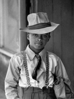 blackhistoryalbum:  LITTLE BIG MAN | 1950sA dapper young man by Henri Cartier-Bresson. Follow us on Tumblr  Pinterest  Facebook  Twitter