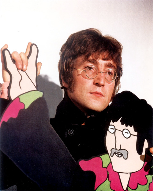 psychedelic-sixties:The Beatles posing with their cardboard Yellow Submarine (1968)