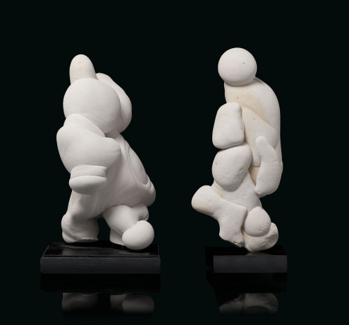 A pair of gogottes, Fontainebleau, France,Each of natural form, from the Oligocene (circa 30 million