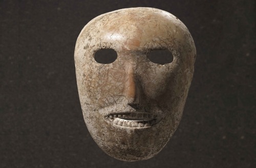 magictransistor:  Neolithic mask carved out of limestone some 9,000  years ago.