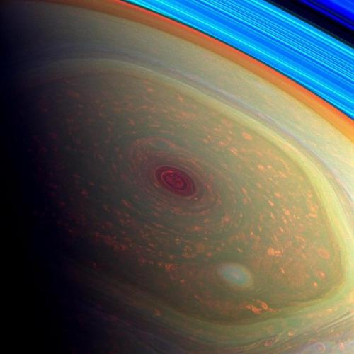 astronomyblog:  Saturn’s atmosphere exhibits a banded pattern similar to Jupiter’s, but Saturn’s bands are much fainter and are much wider near the equator. The nomenclature used to describe these bands is the same as on Jupiter. Saturn’s finer