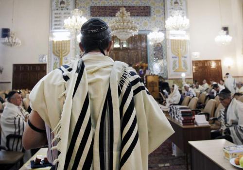 caryophylla:Photos of Iranian Jews in a synagogue in Tehran, Iran, participating in morning and Hanu