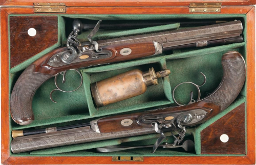 A cased pair of Irish flintlock dueling pistols by Tomlinson of Dublin, circa 1800.Sold at Auction: 