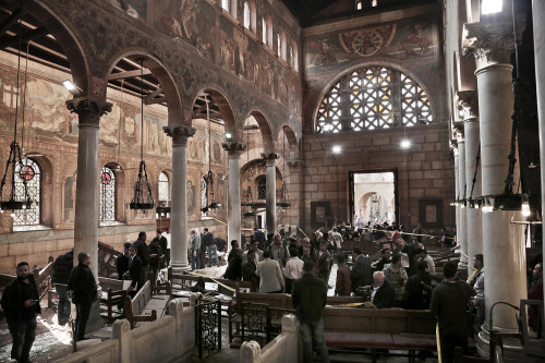 yahoonewsphotos: Bomb blast kills dozens at Cairo Coptic church A bombing at a chapel adjacent to Eg