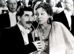  Groucho Marx and Margaret Dumont sip up